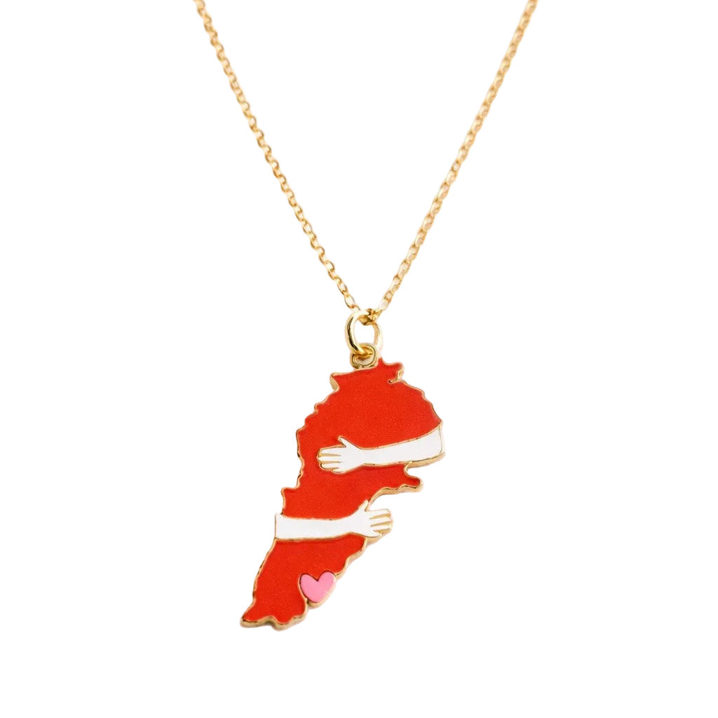 Necklace with a red and white heart-shaped pendant on a white background