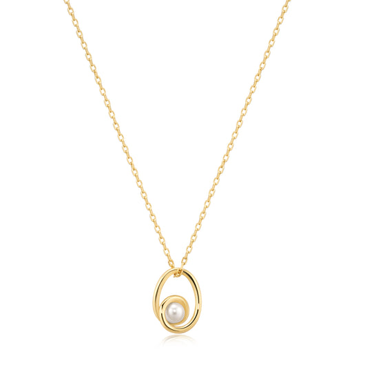 Gold necklace with a pearl pendant on a white background
